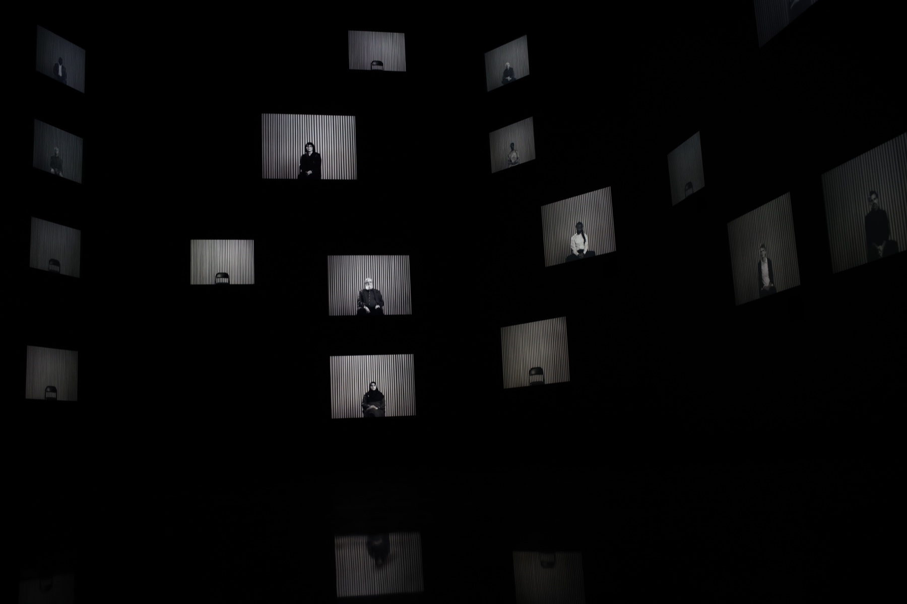 A constellation of interview screens inside The Conversation Machine