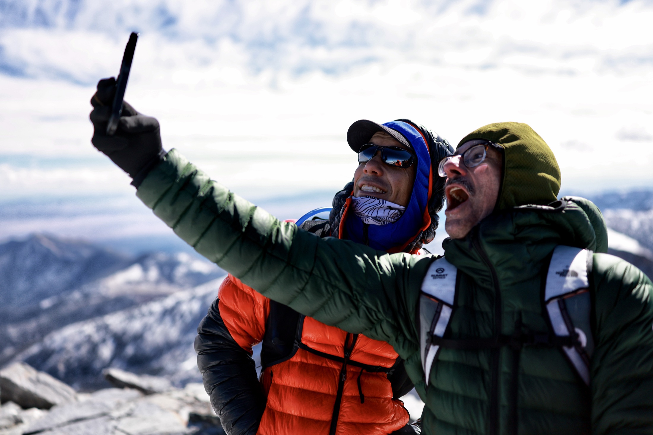 Alex Honnold sharing a joyful summit moment in Nevada
