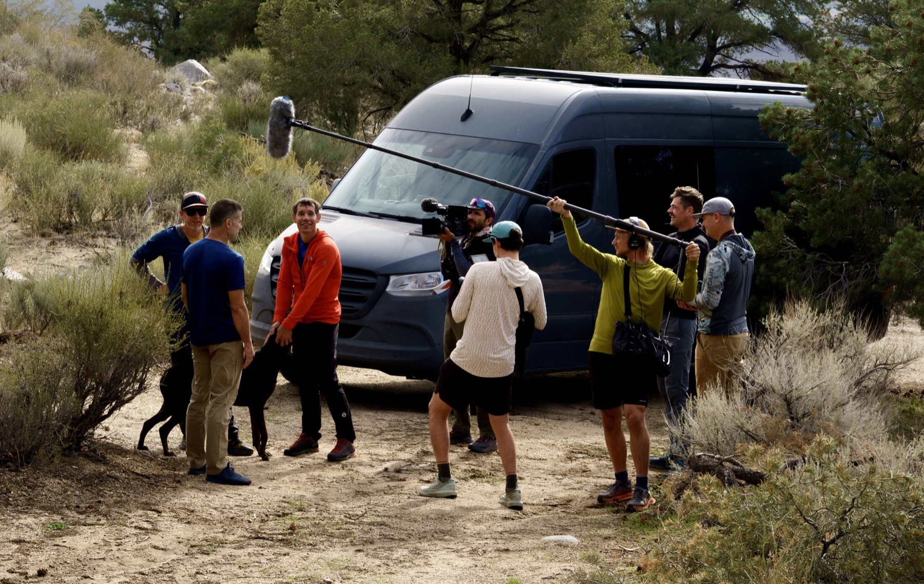Alex Honnold and the production crew filming beside his van