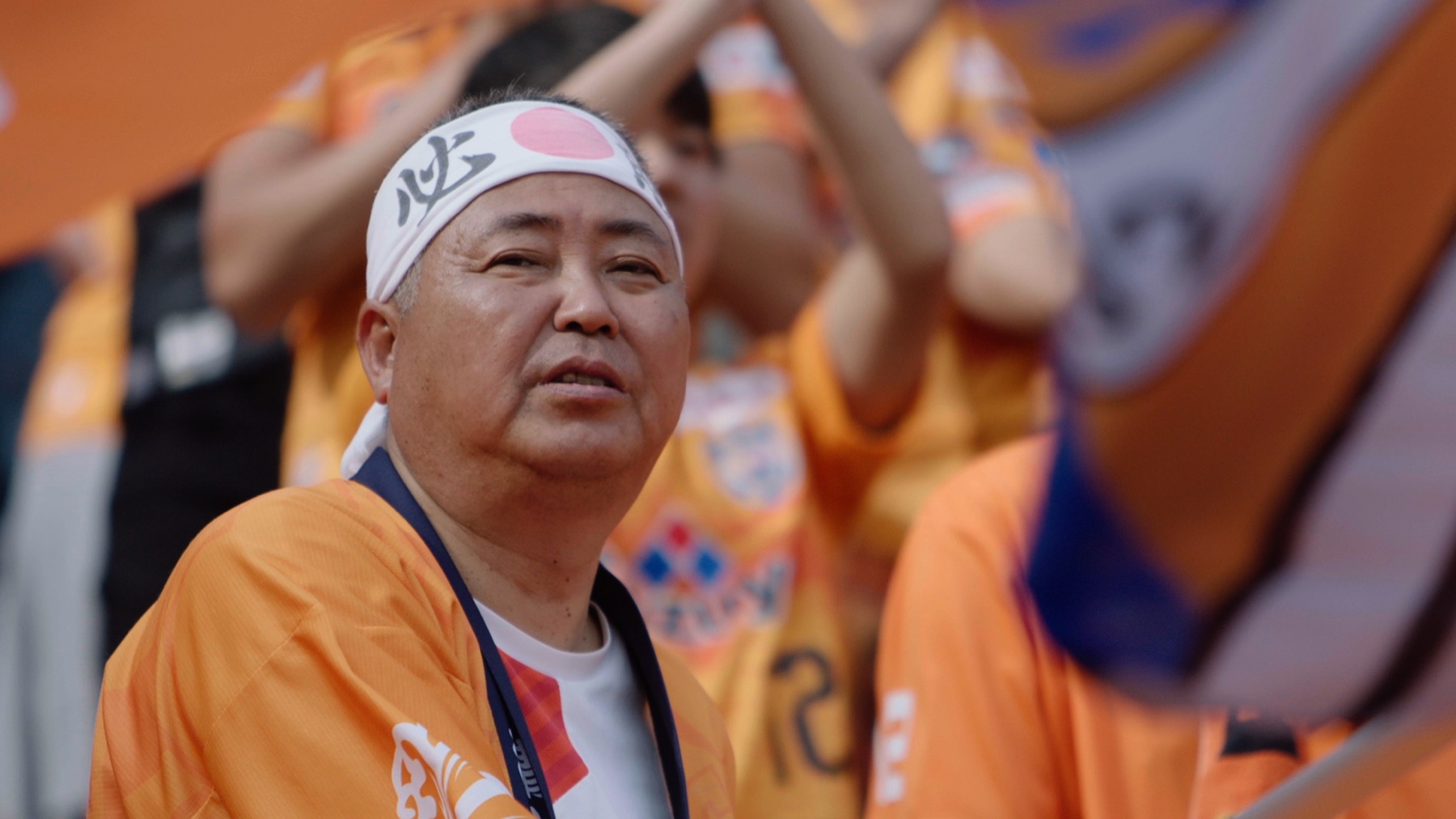 A football supporter watching from the stands