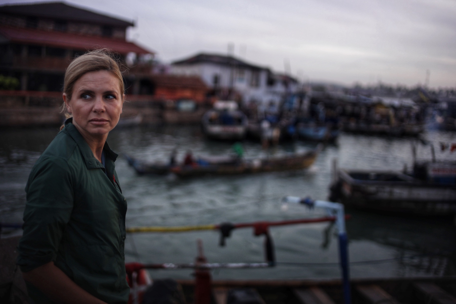 Mariana van Zeller reporting at a working harbor